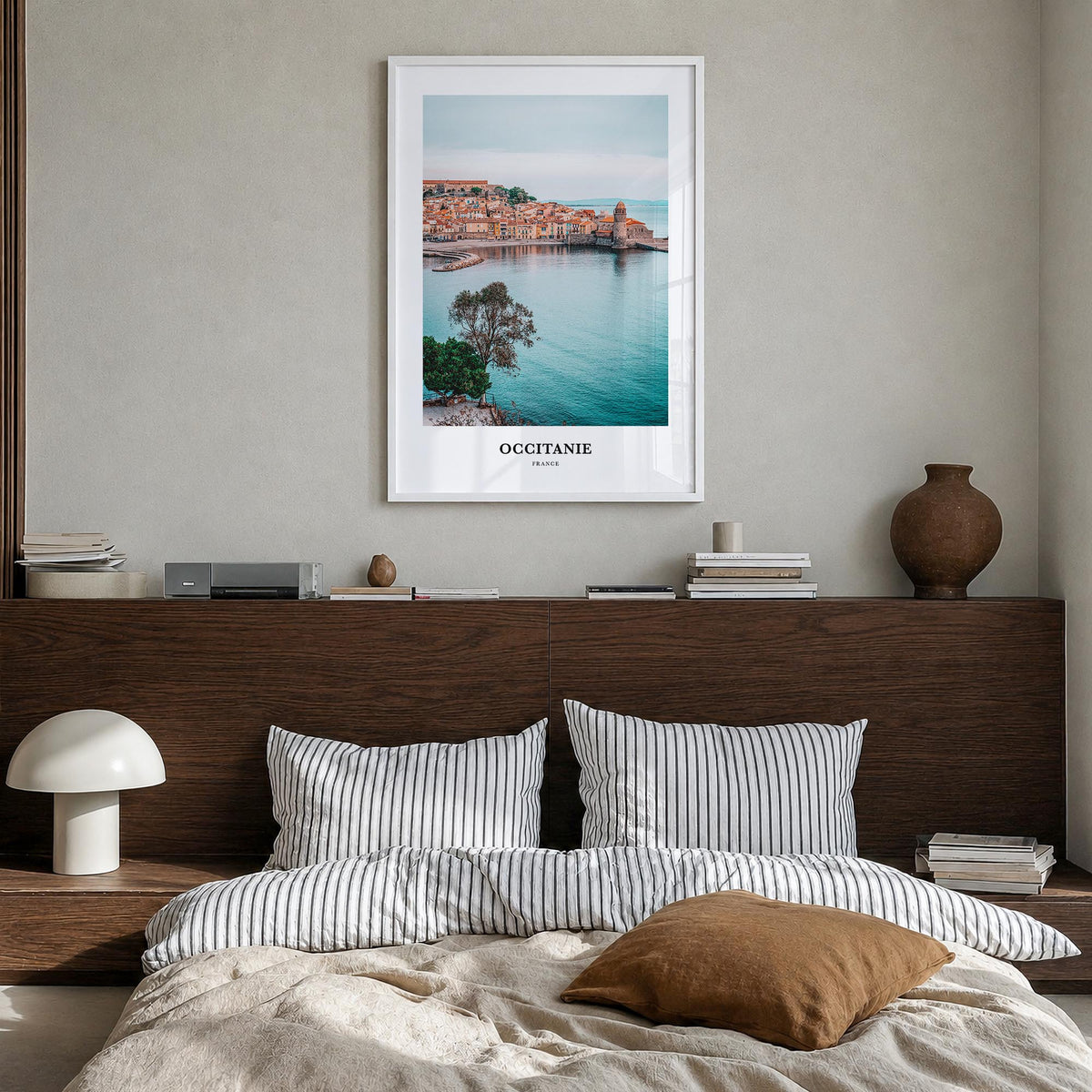 Occitanie colorful classic poster of France – vertical wall art in white wood frame, hanging on wall