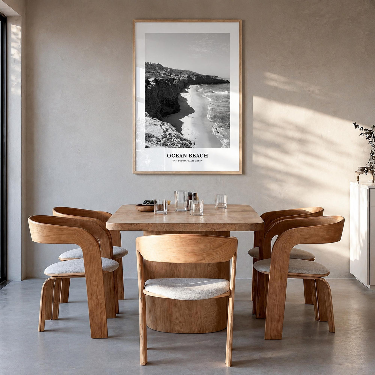 Ocean Beach black & white classic poster of San Diego, California – vertical wall art in natural wood frame, hanging on wall