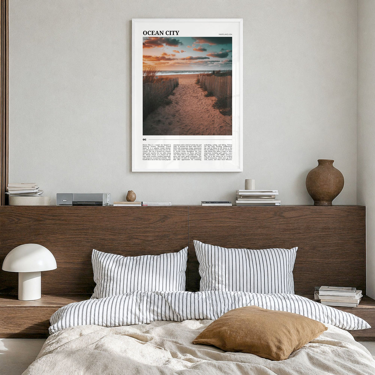 Ocean City, Maryland Travel Poster in a white wood frame, hanging in a bedroom