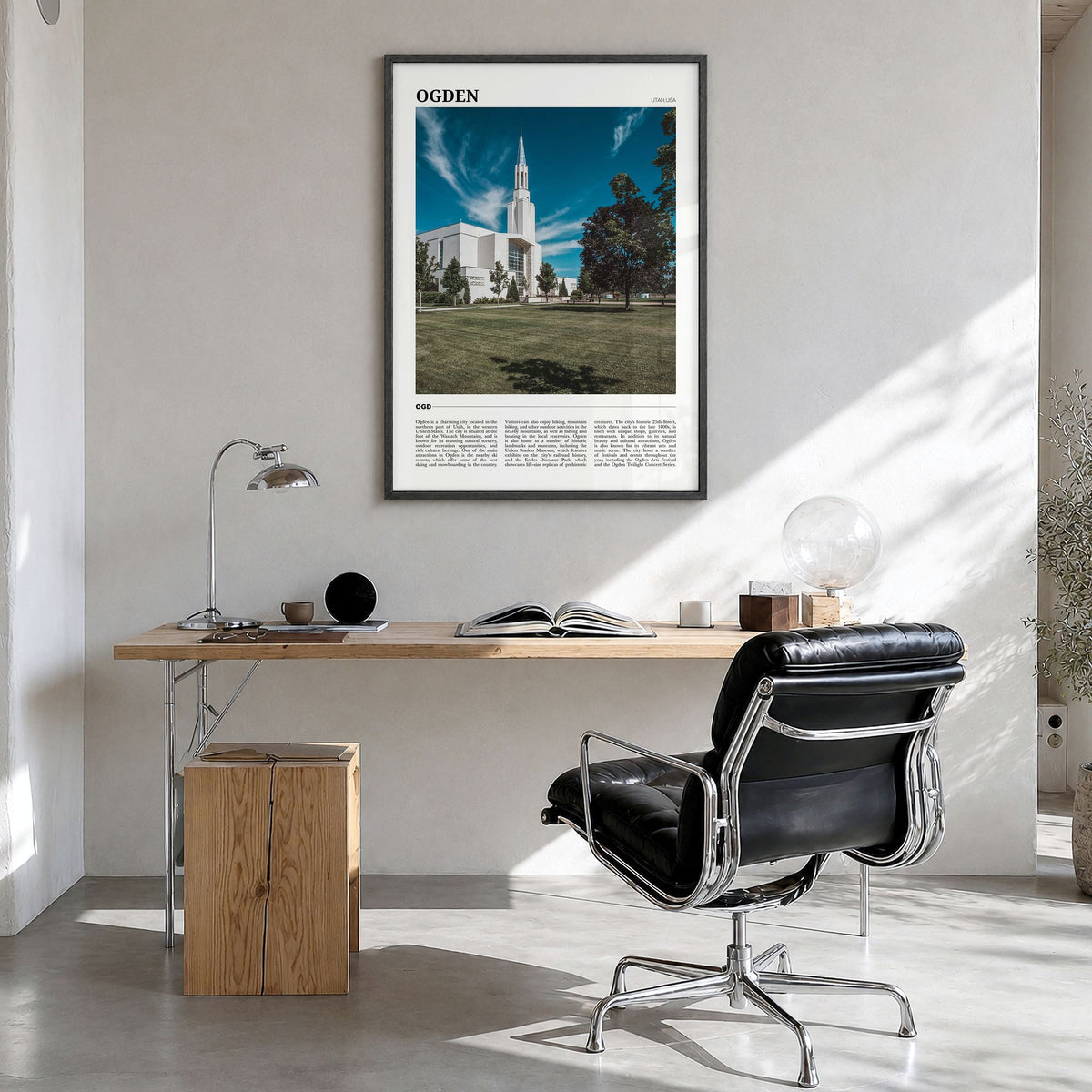 Ogden Travel Poster in a black wood frame, hanging in a bright home office