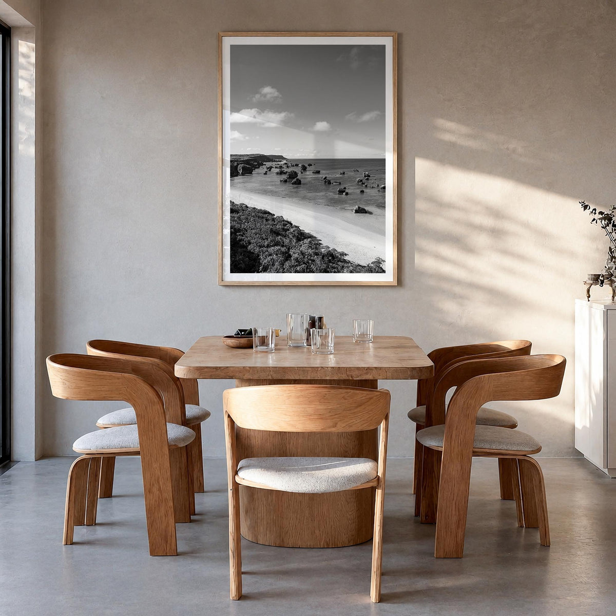 Okinawa black & white photo poster of Japan – vertical wall art in natural wood frame with white border, hanging on wall