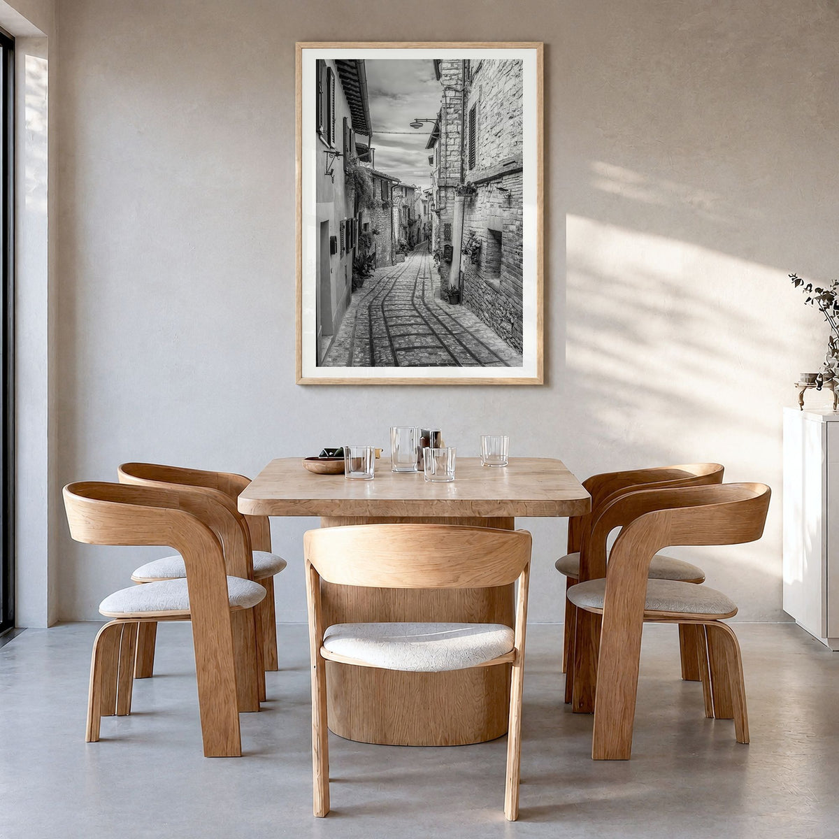 Old Town in Italy Photo Poster in a natural wood frame, hanging in a dining room, white border