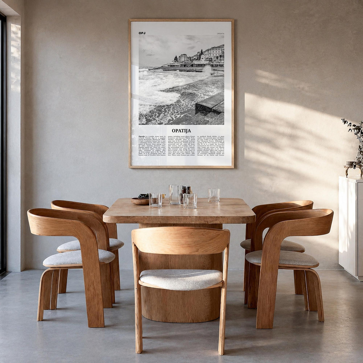 Opatija black & white newspaper poster of Croatia – vertical wall art in natural wood frame, hanging on wall