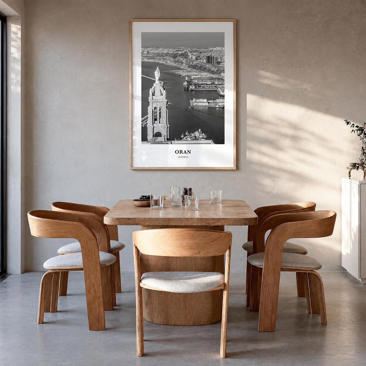 Oran black & white classic poster of Algeria – vertical wall art in natural wood frame, hanging on wall