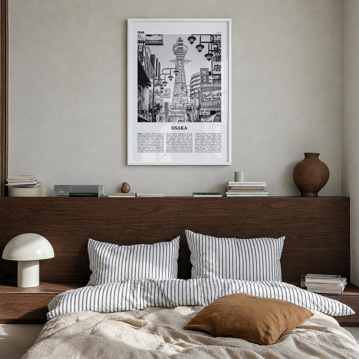 Osaka black & white newspaper poster of Japan – vertical wall art in white wood frame, hanging on wall