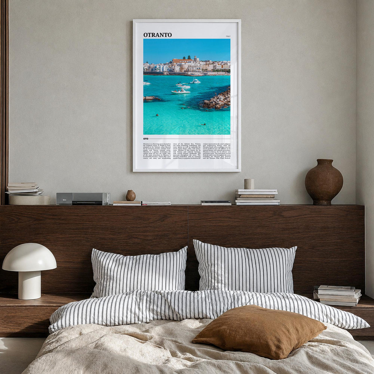 Otranto colorful travel poster of Italy – vertical wall art in white wood frame, hanging on wall