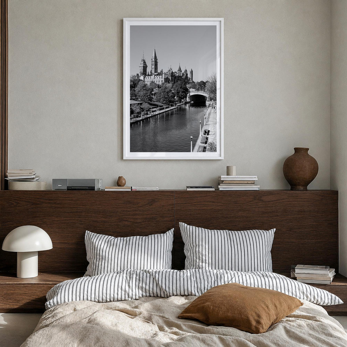 Ottawa black & white photo poster of Ontario, Canada – vertical wall art in white wood frame with white border, hanging on wa