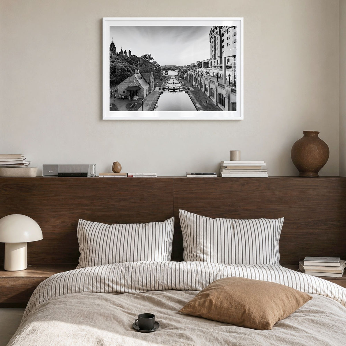 Ottawa Photo Poster in a white wood frame, hanging in a bedroom, white border