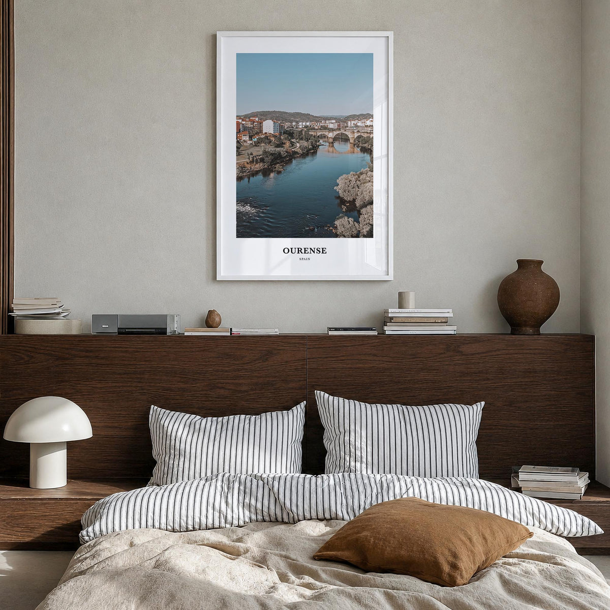 Ourense colorful classic poster of Spain – vertical wall art in white wood frame, hanging on wall