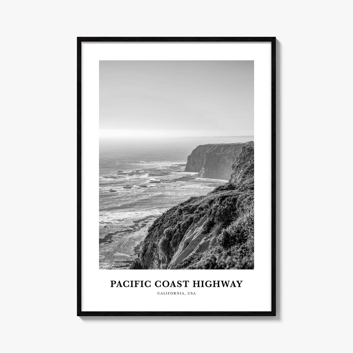 Pacific Coast Highway black & white classic poster of California, USA – vertical wall art, unframed print shown in interior m