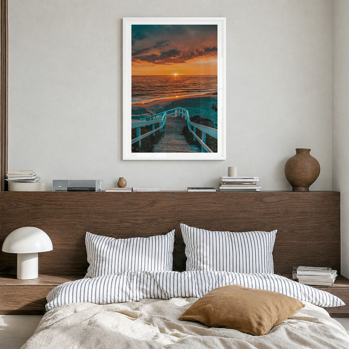 Pacific Ocean Photo Poster in a white wood frame, hanging in a bedroom, white border