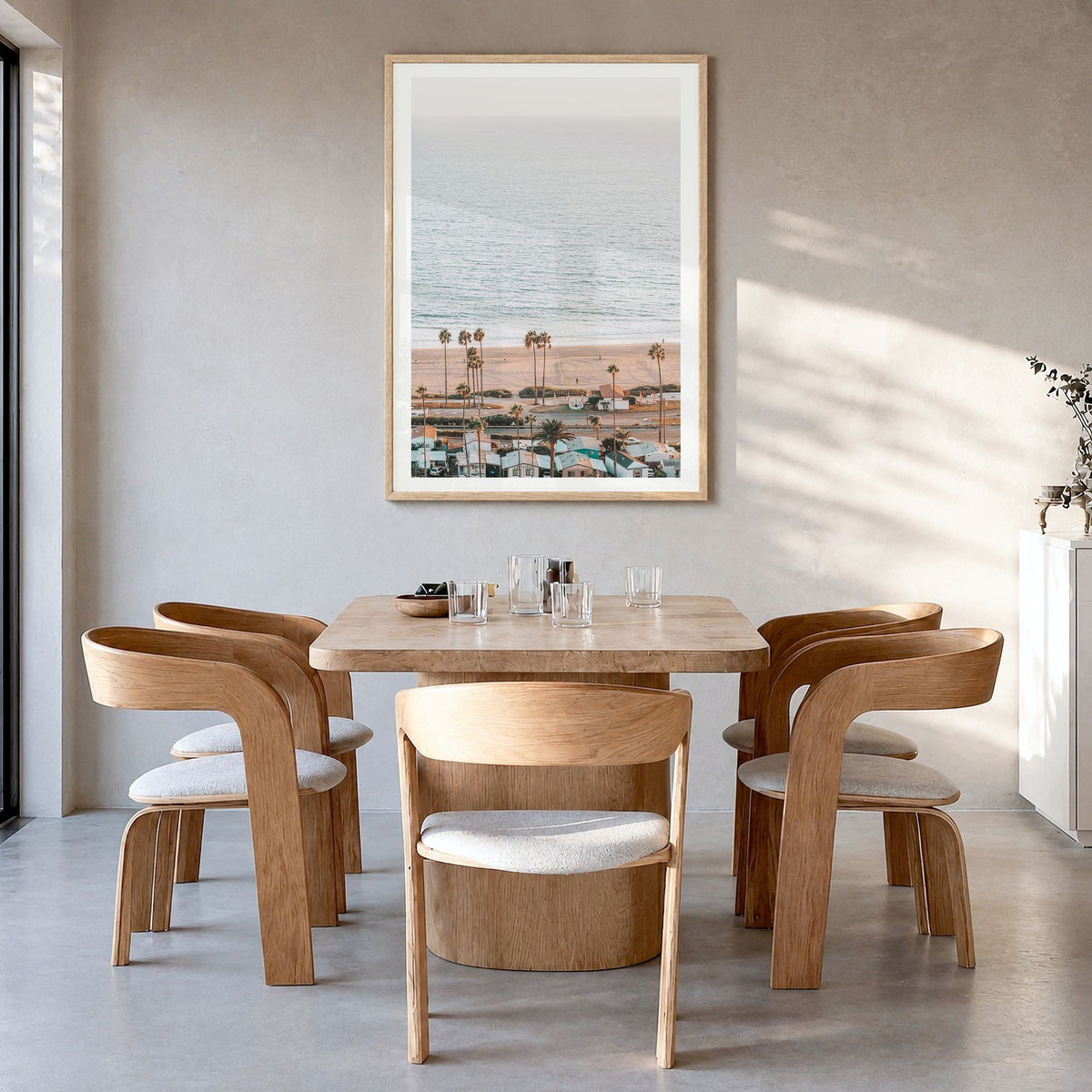 Pacific Palisades Photo No 3 Poster in a natural wood frame, hanging in a dining room, white border