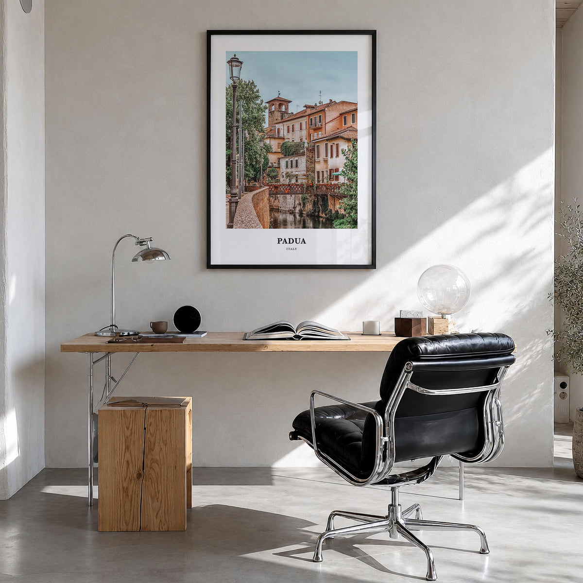 Padua colorful classic poster of Italy – vertical wall art in black wood frame, hanging on wall