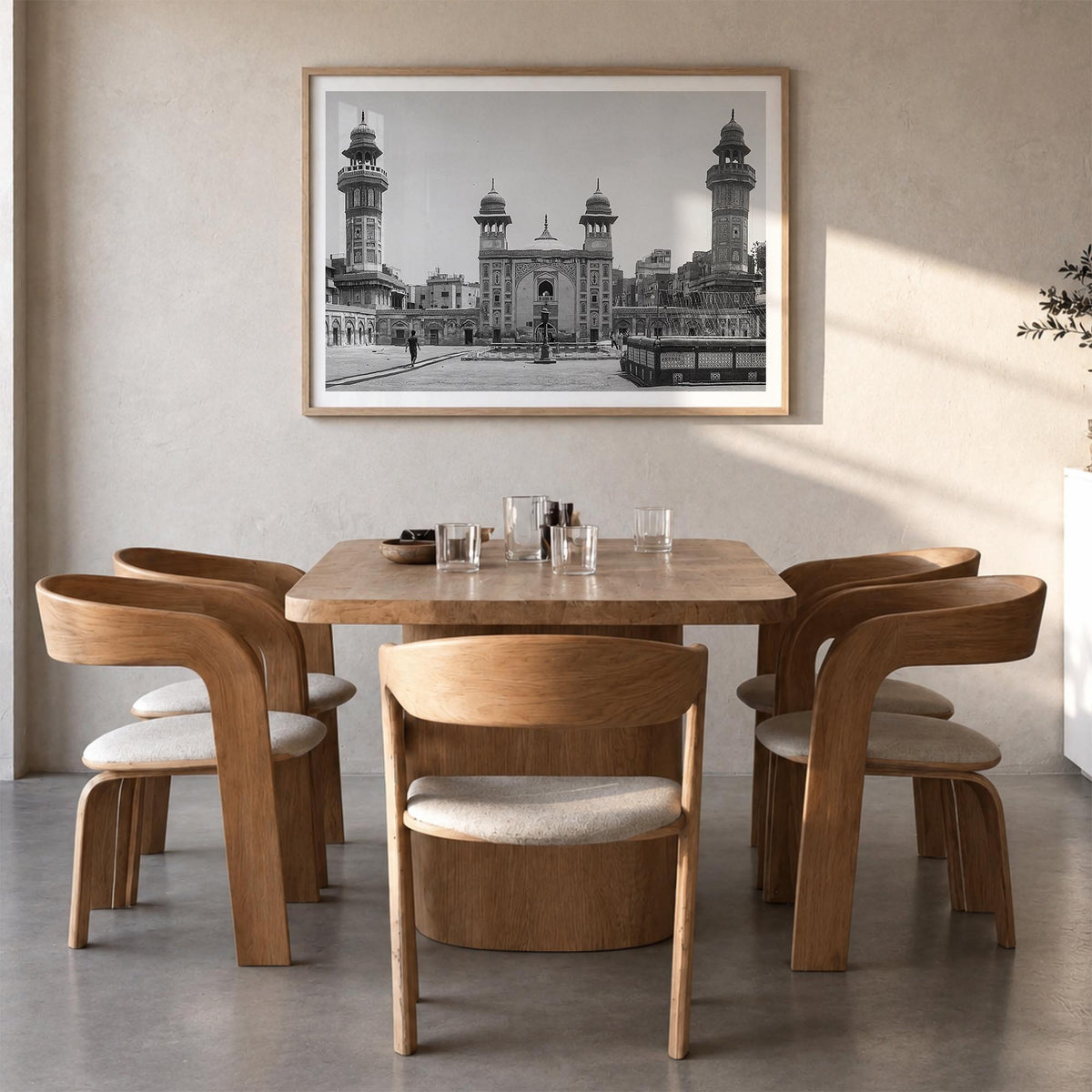 Pakistan black & white photo poster of Asia – horizontal wall art in natural wood frame with white border, hanging on wall
