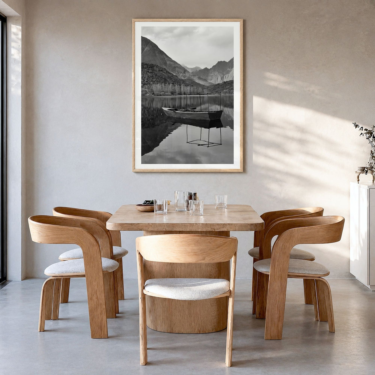 Pakistan Photo Poster in a natural wood frame, hanging in a dining room, white border