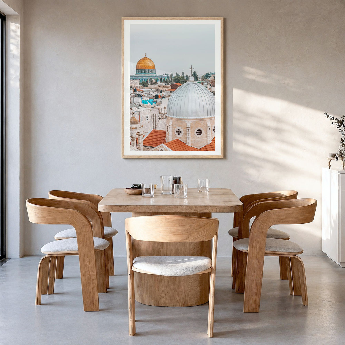 Palestine Photo Poster in a natural wood frame, hanging in a dining room, white border