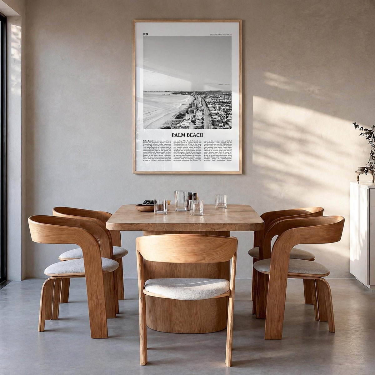Palm Beach, Queensland black & white newspaper poster of Australia – vertical wall art in natural wood frame, hanging on wall