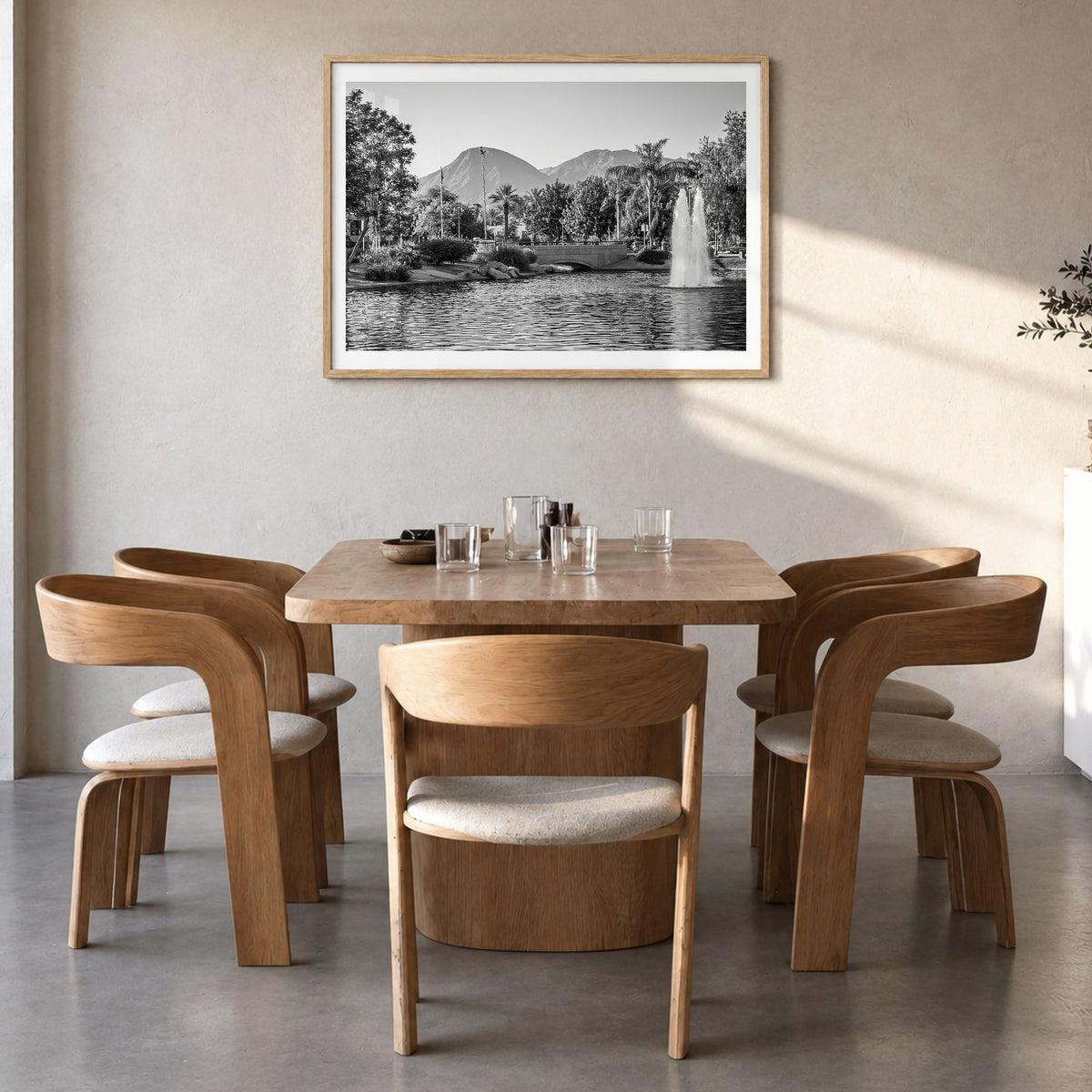 Palm Springs Photo Poster in a natural wood frame, hanging in a dining room, white border