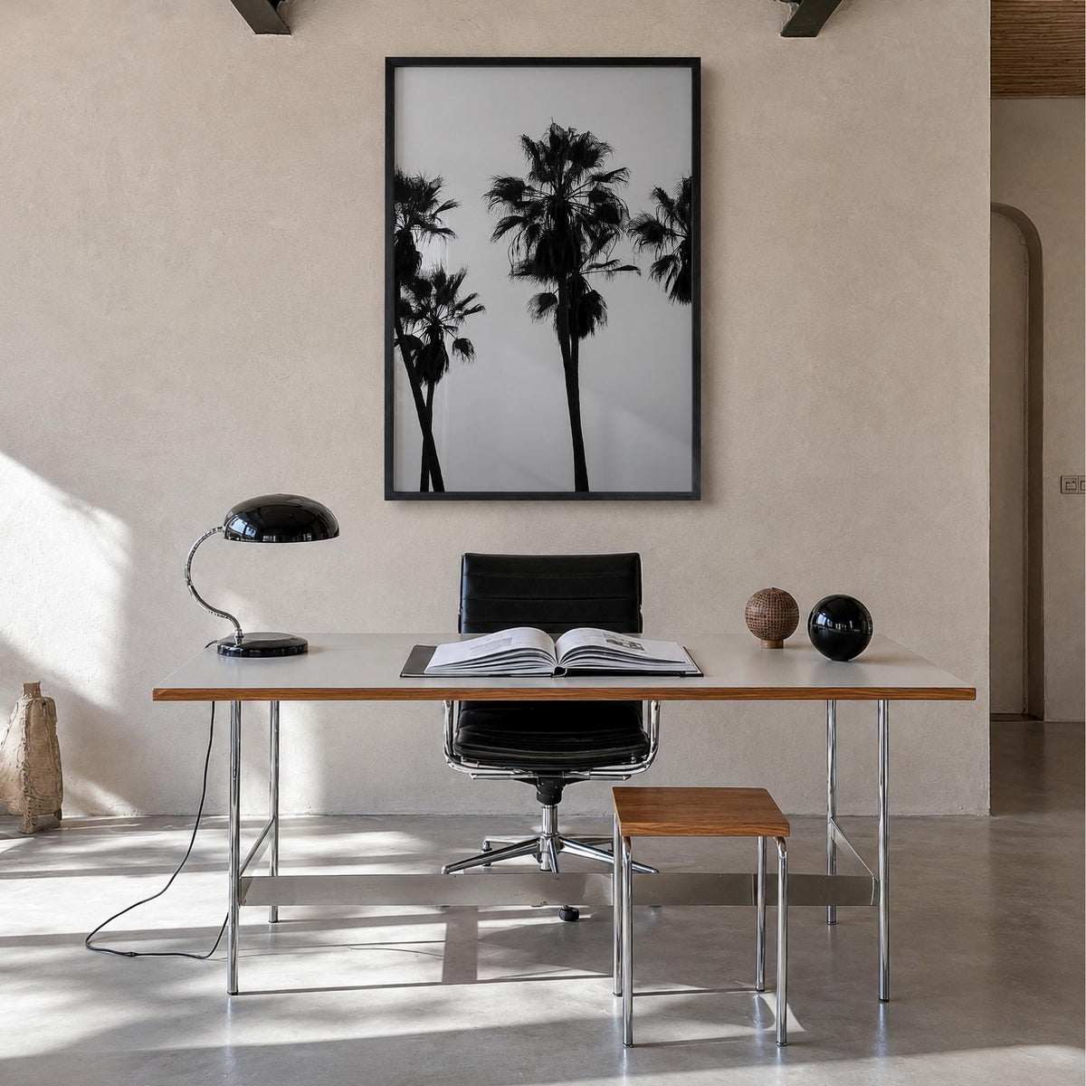 Palms black & white photo poster – vertical wall art in black wood frame, hanging on wall