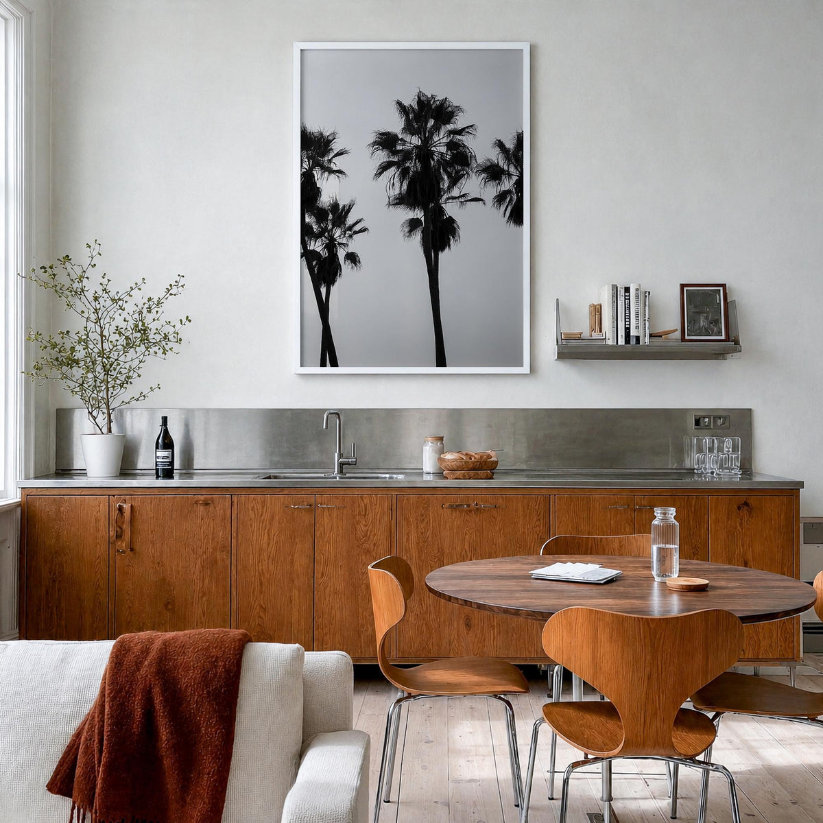 Palms black & white photo poster – vertical wall art in white wood frame, hanging on wall
