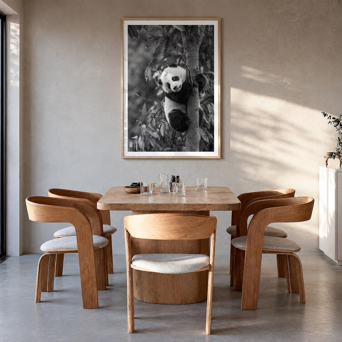 Panda Bear no. 2 black & white photo poster – vertical wall art in natural wood frame with white border, hanging on wall