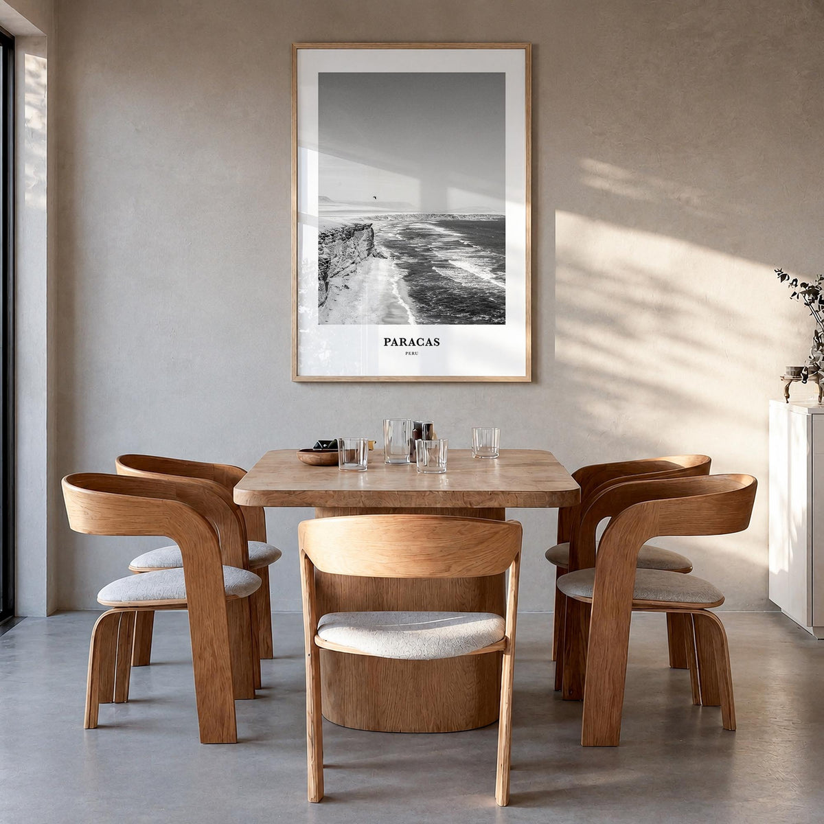 Paracas black & white classic poster of Peru – vertical wall art in natural wood frame, hanging on wall