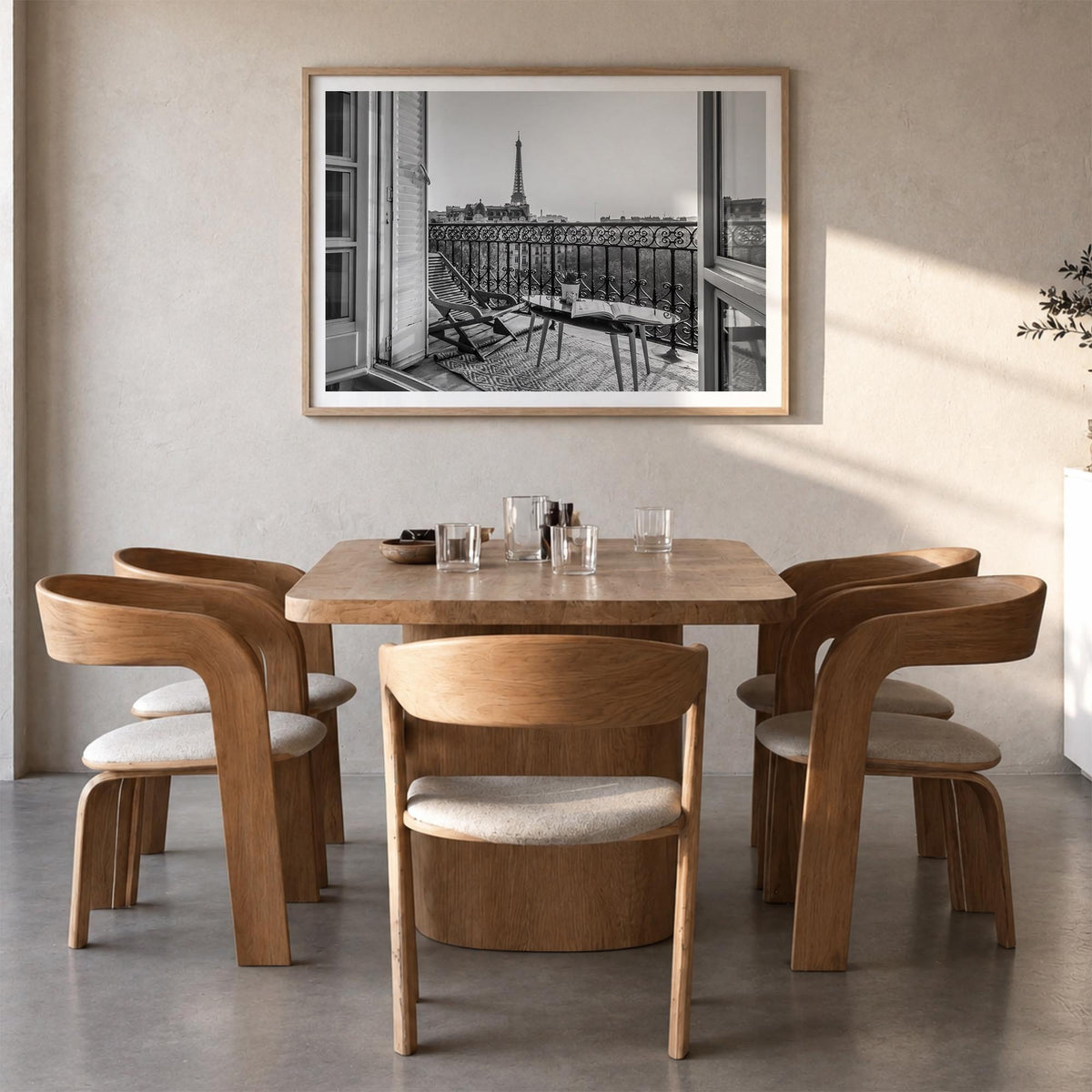Paris no. 1 black & white photo poster of France – horizontal wall art in natural wood frame with white border, hanging on wa