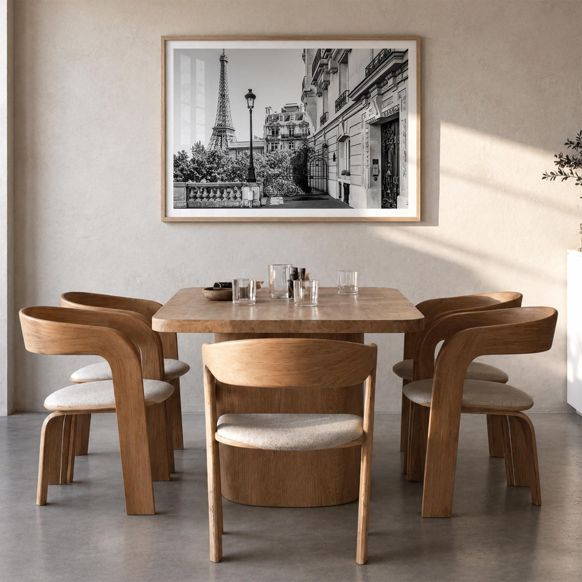 Paris no. 2 black & white photo poster of France – horizontal wall art in natural wood frame with white border, hanging on wa