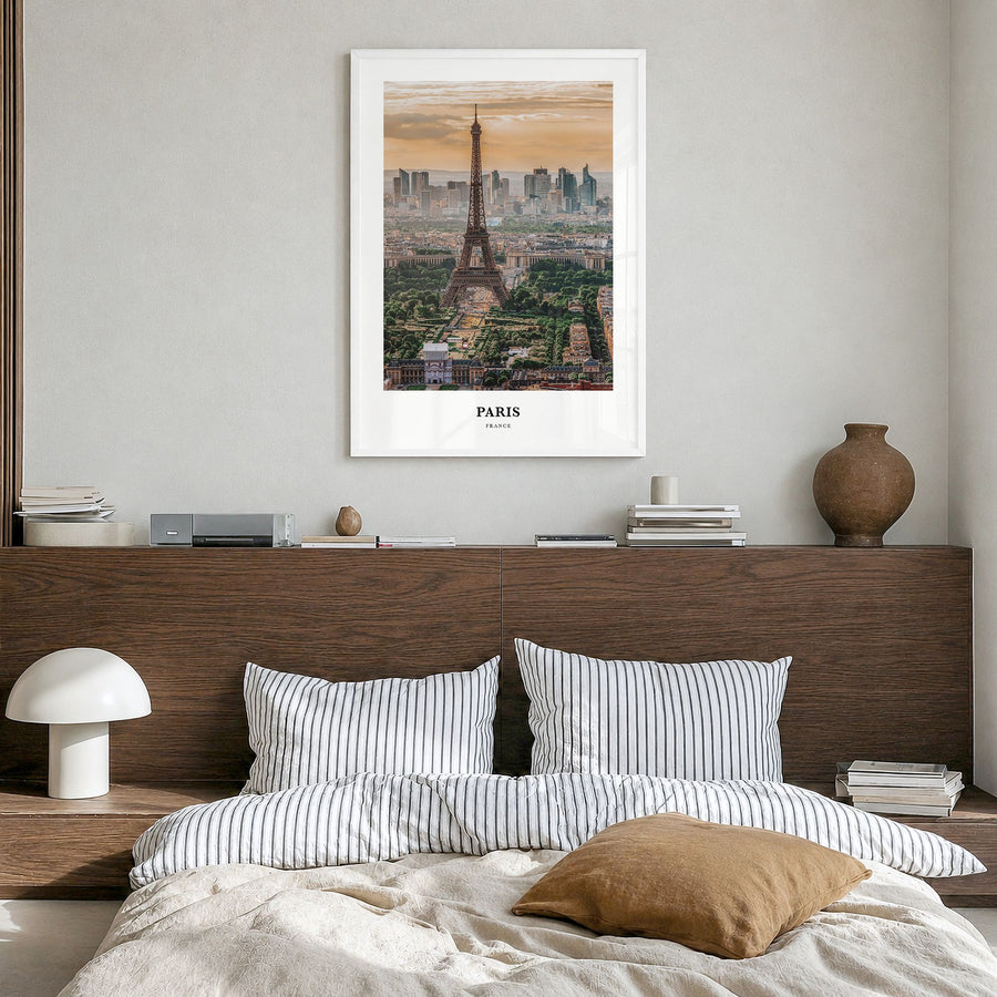 Paris Classic Poster in a white wood frame, hanging in a bedroom