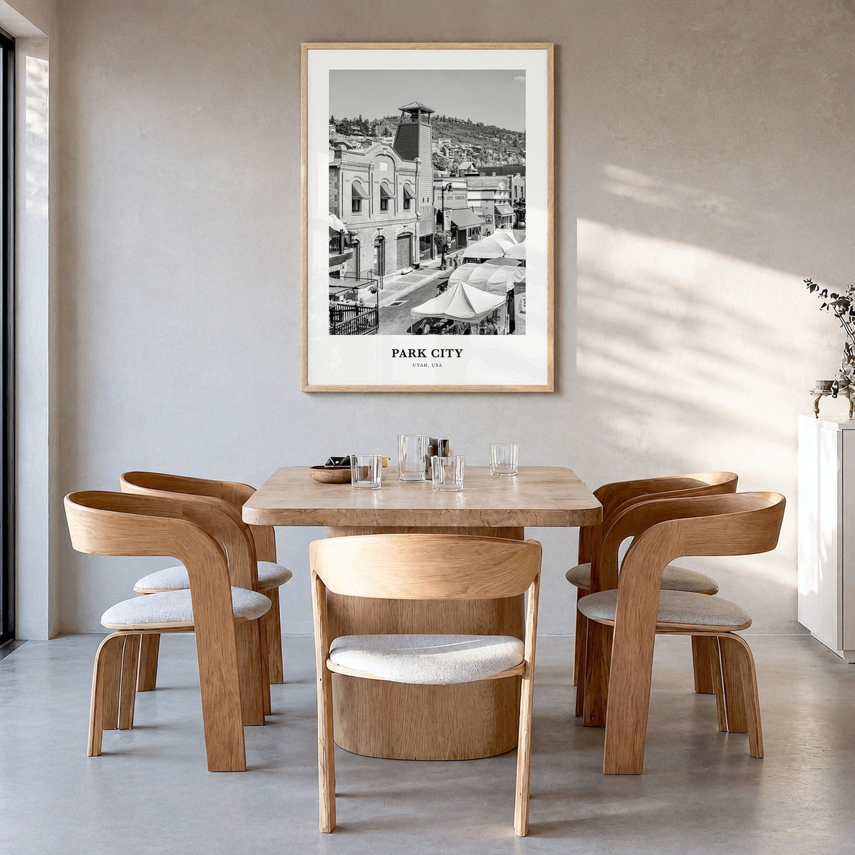 Park City Classic Poster in a natural wood frame, hanging in a dining room