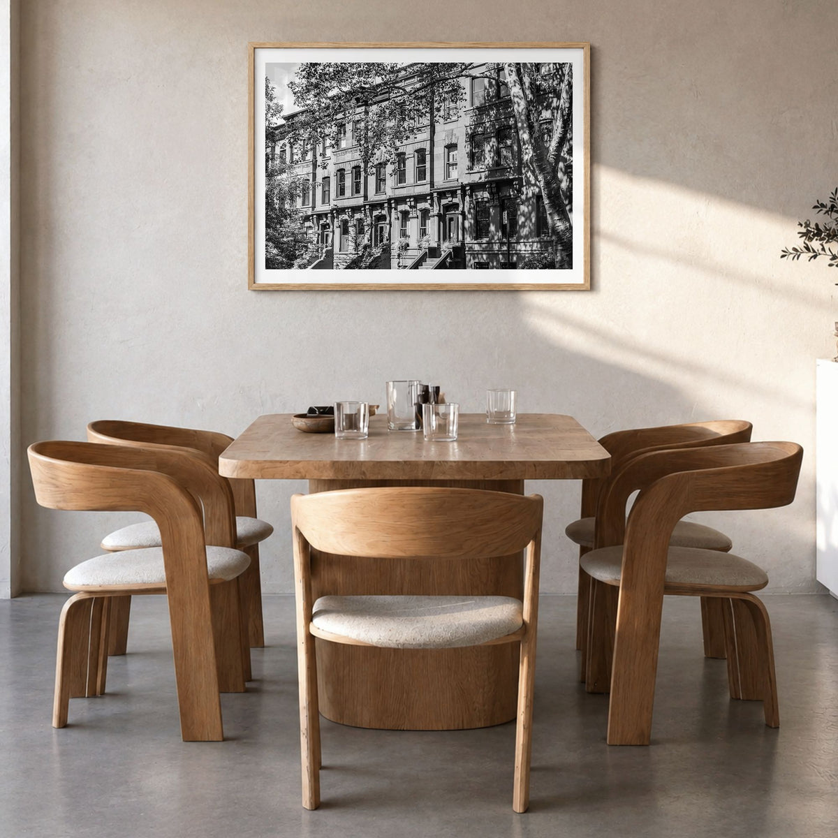 Park Slope Photo Poster in a natural wood frame, hanging in a dining room, white border