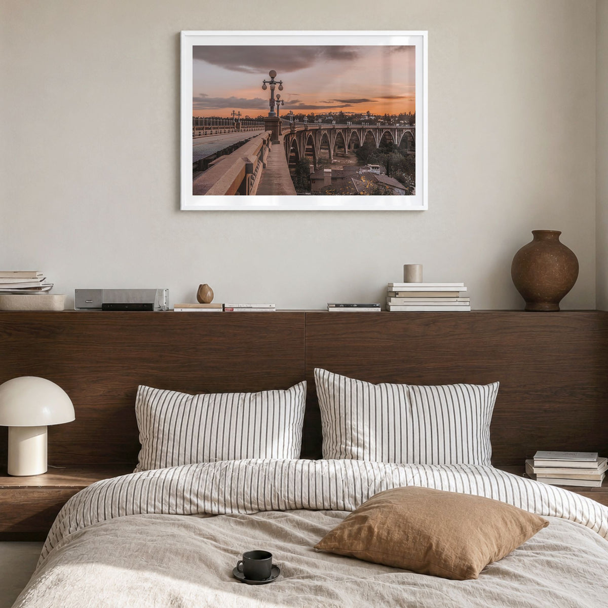 Pasadena Photo Poster in a white wood frame, hanging in a bedroom, white border