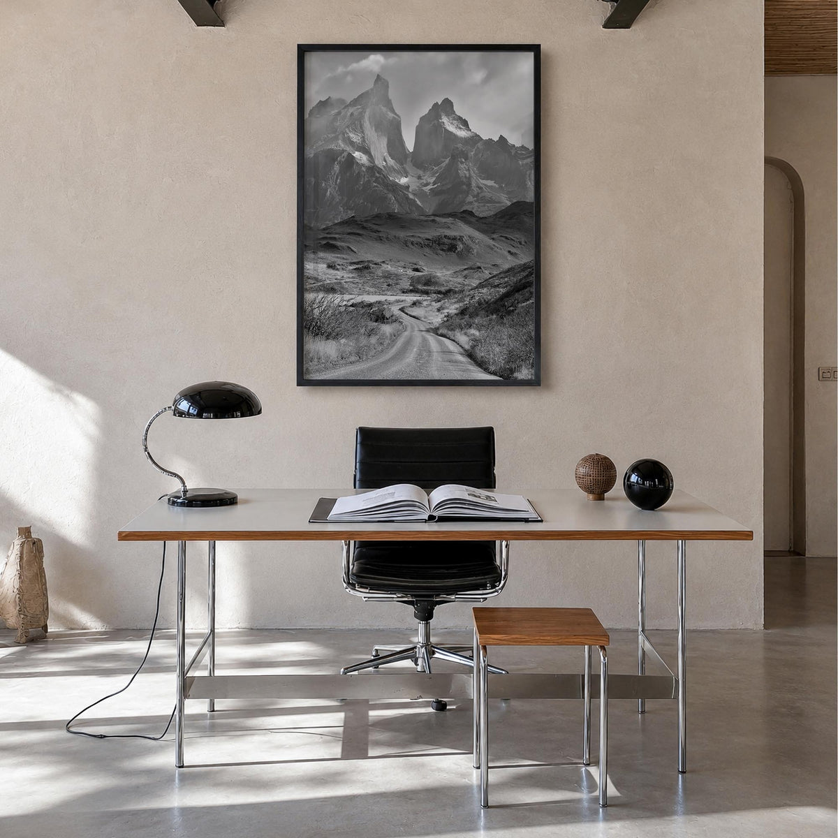 Patagonia black & white photo poster of Argentina & Chile – vertical wall art in black wood frame, hanging on wall