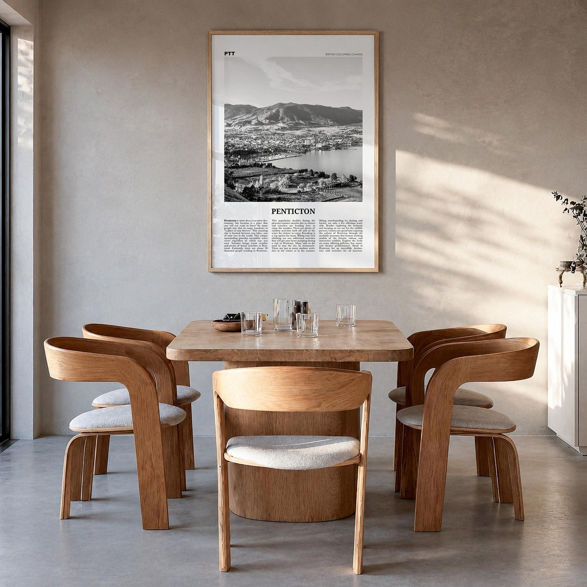 Penticton black & white newspaper poster of Canada – vertical wall art in natural wood frame, hanging on wall