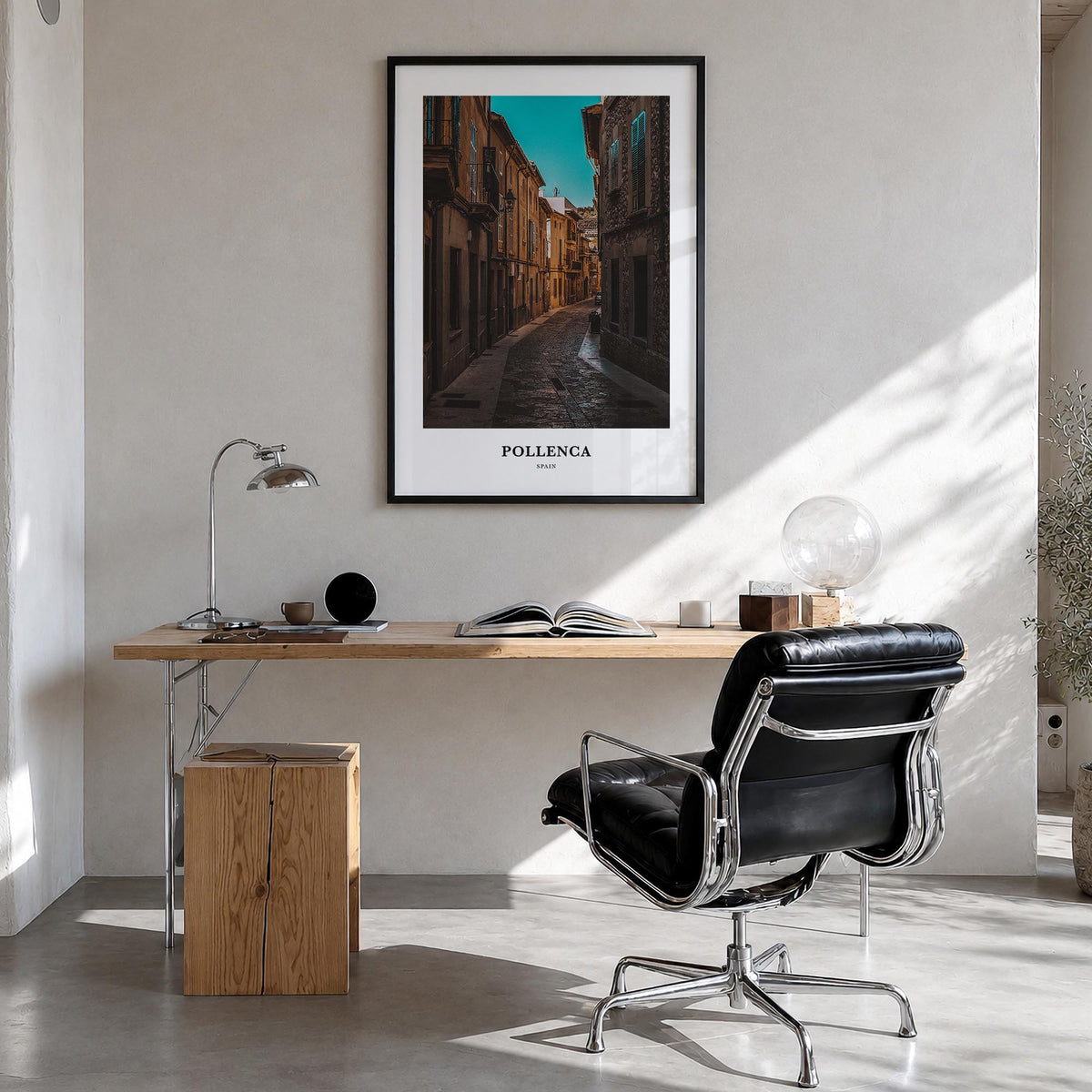 Pollença colorful classic poster of Spain – vertical wall art in black wood frame, hanging on wall