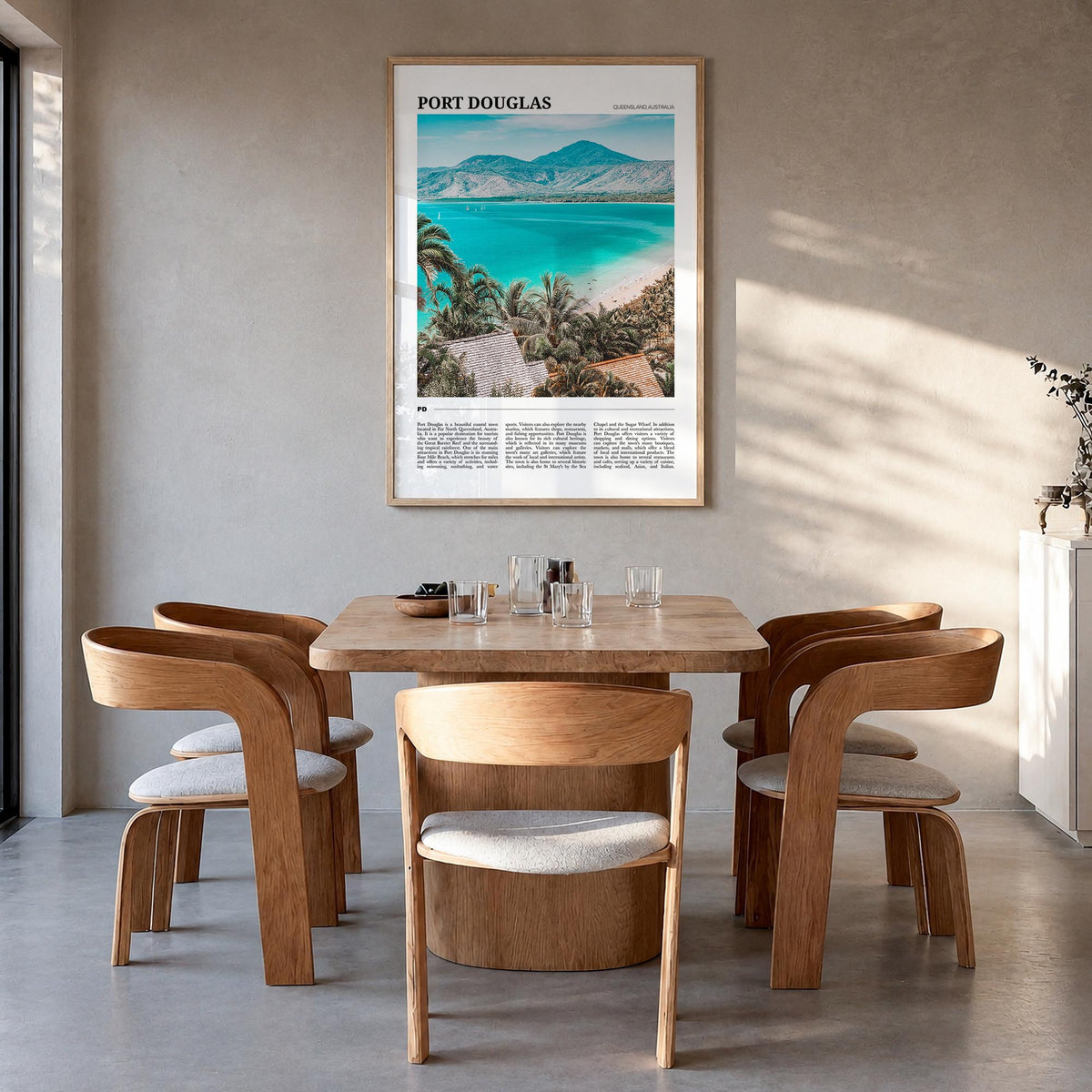Port Douglas colorful travel poster of Queensland, Australia – vertical wall art in natural wood frame, hanging on wall