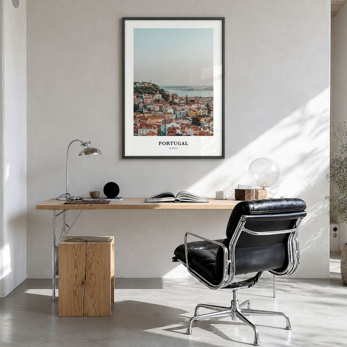 Portugal Classic Poster in a black wood frame, hanging in a bright home office