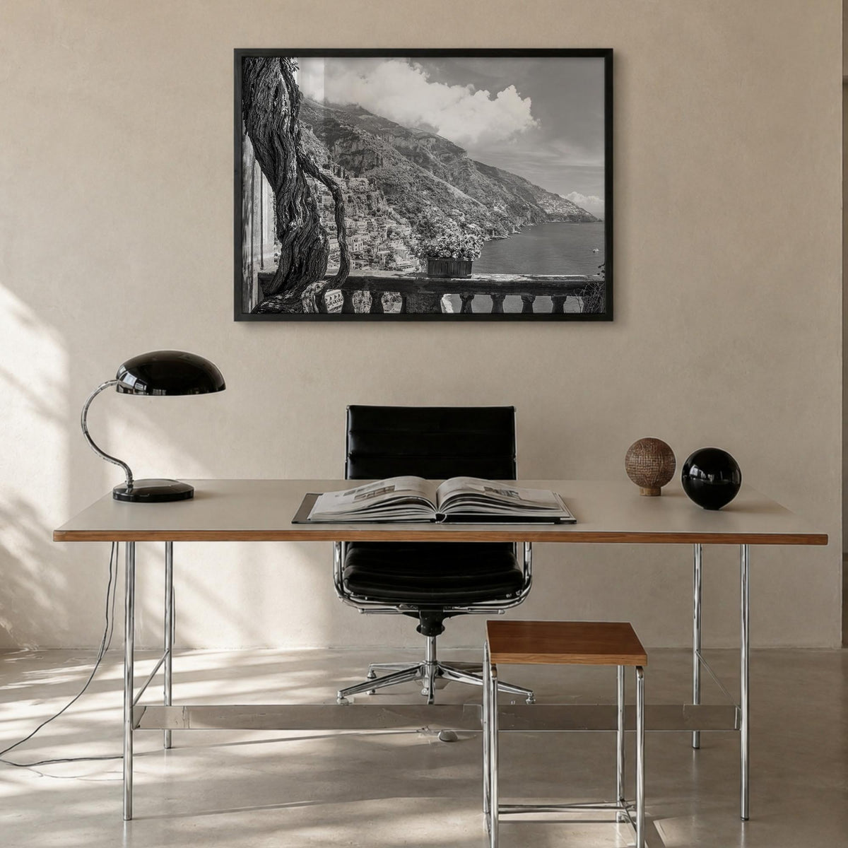 Positano no. 1 black & white photo poster of Italy – horizontal wall art in black wood frame, hanging on wall