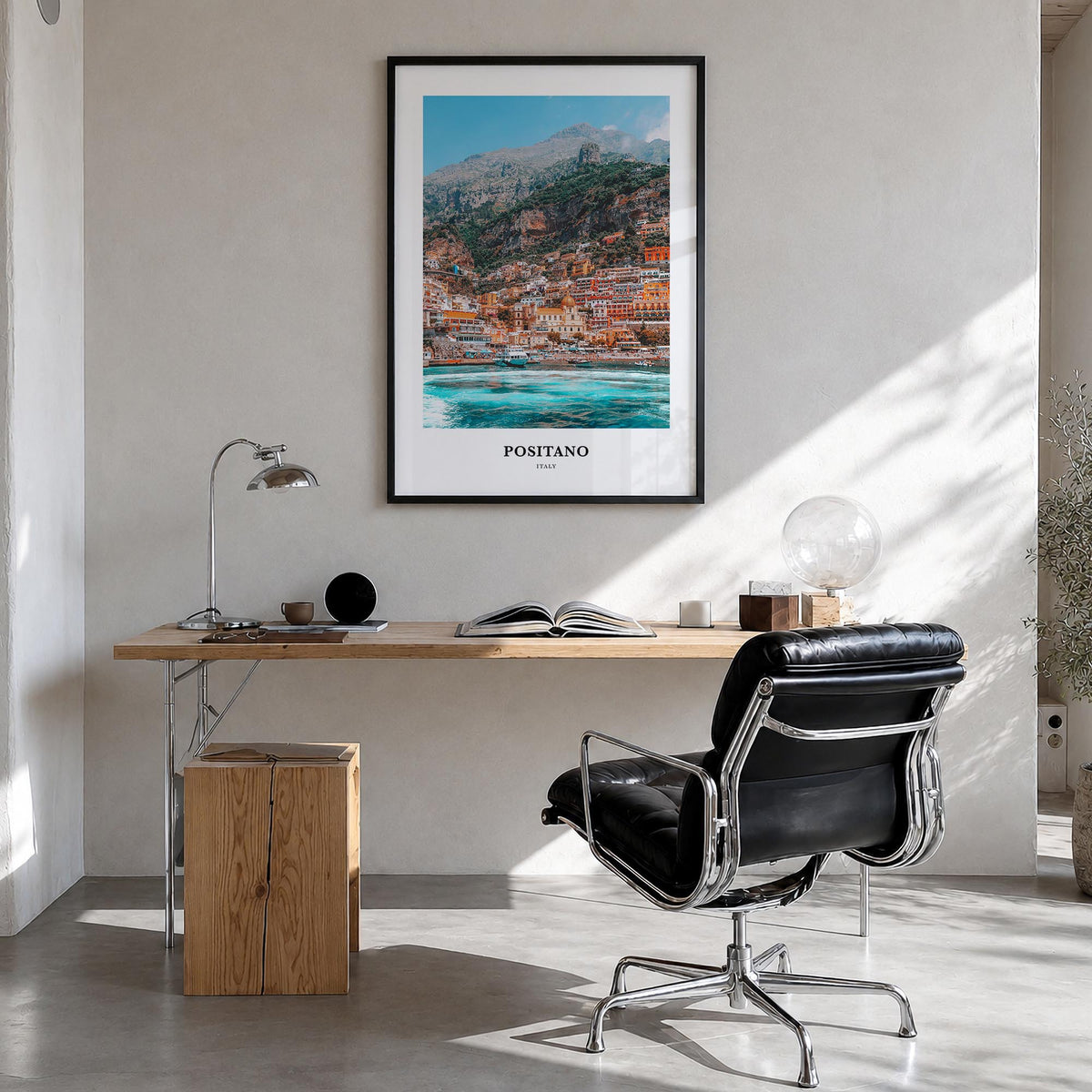 Positano no. 1 colorful classic poster of Italy – vertical wall art in black wood frame, hanging on wall