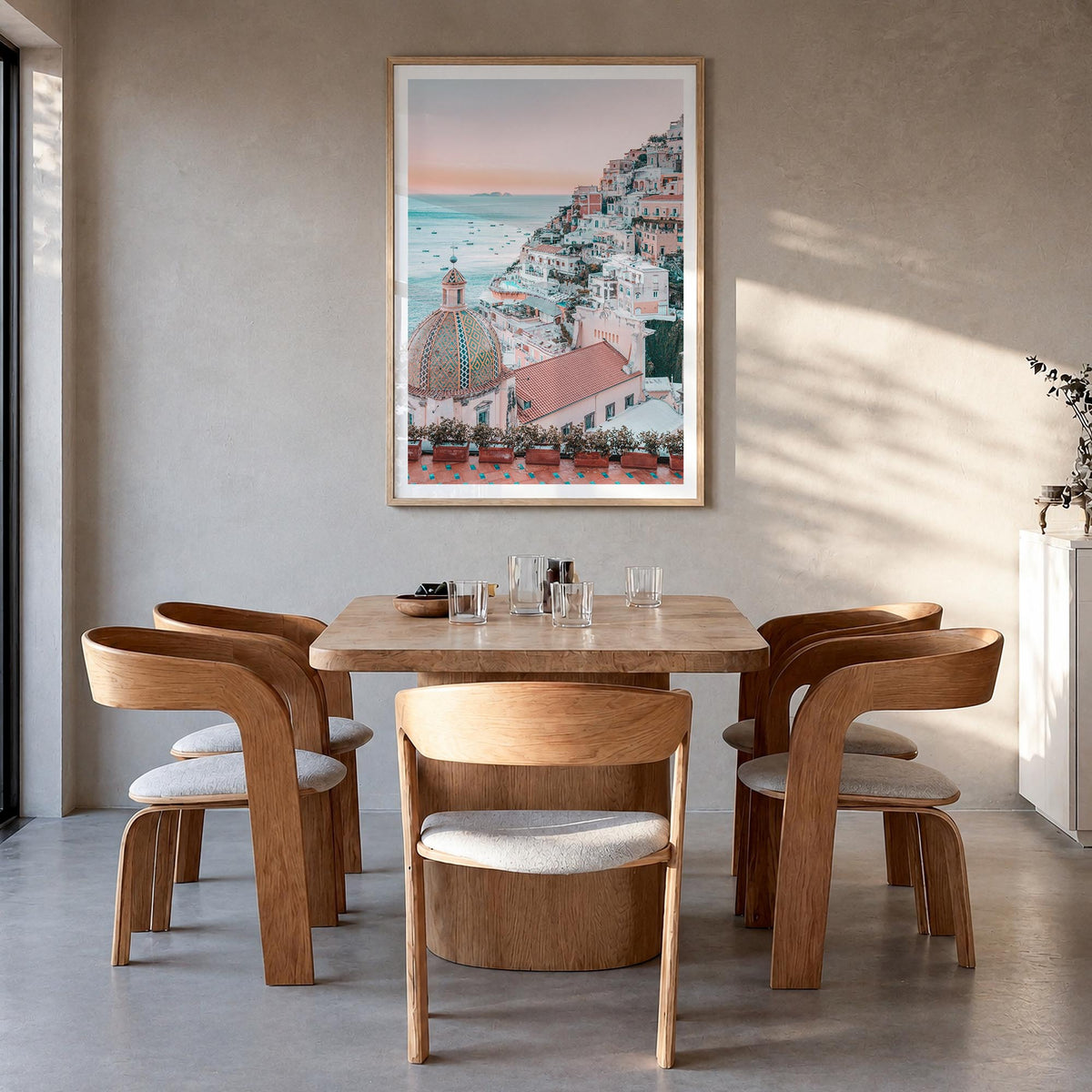 Positano no. 1 colorful photo poster of Italy – vertical wall art in natural wood frame with white border, hanging on wall