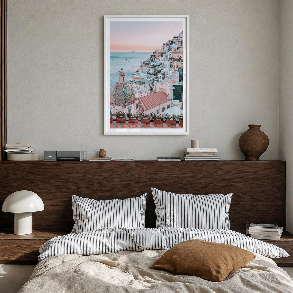 Positano no. 1 colorful photo poster of Italy – vertical wall art in white wood frame with white border, hanging on wall