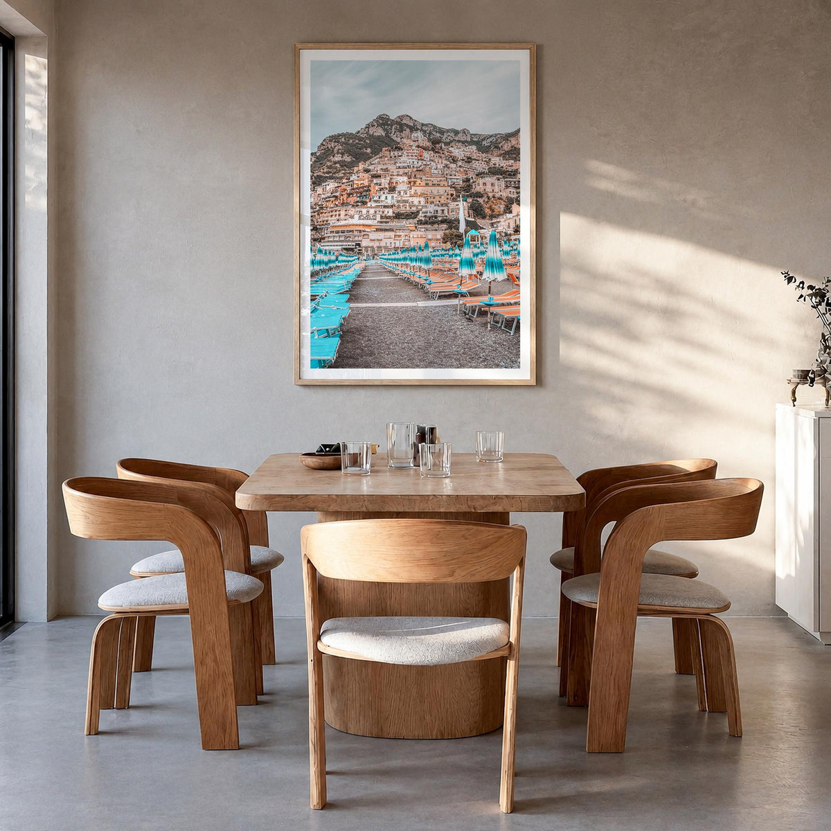 Positano no. 2 colorful photo poster of Italy – vertical wall art in natural wood frame with white border, hanging on wall