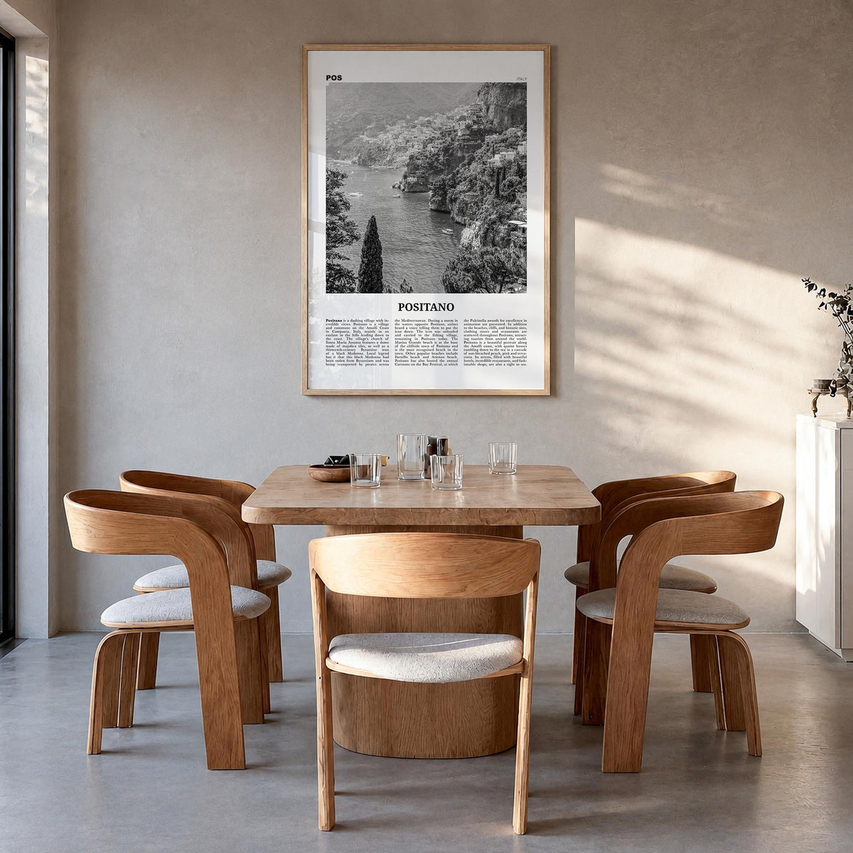 Positano no. 3 black & white newspaper poster of Italy – vertical wall art in natural wood frame, hanging on wall