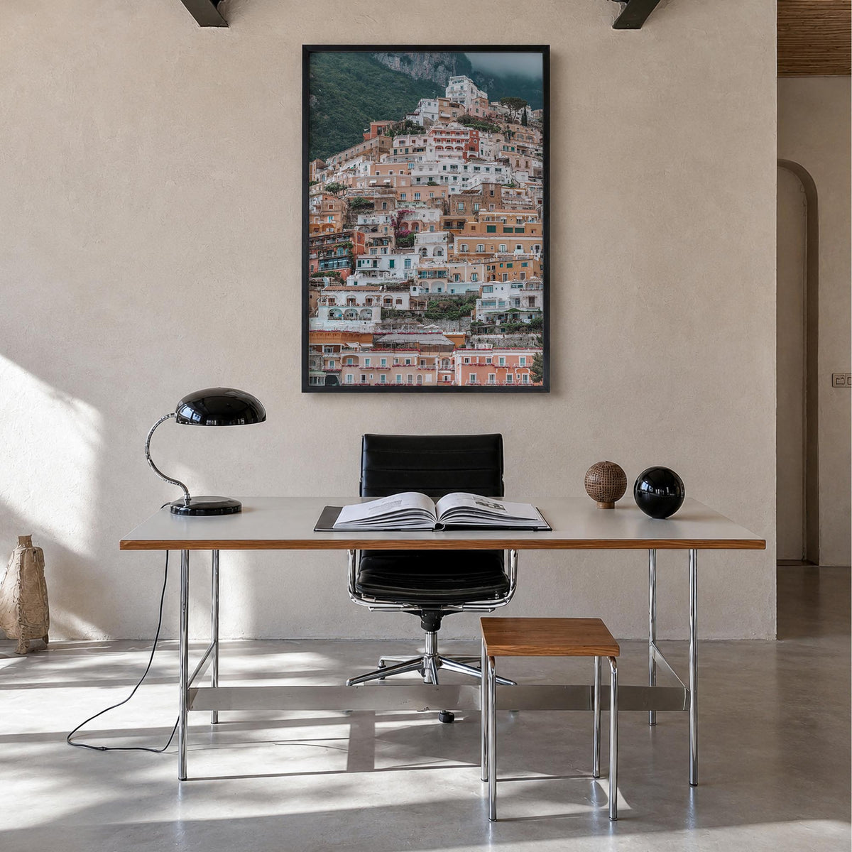 Positano no. 3 colorful photo poster of Italy – vertical wall art in black wood frame, hanging on wall