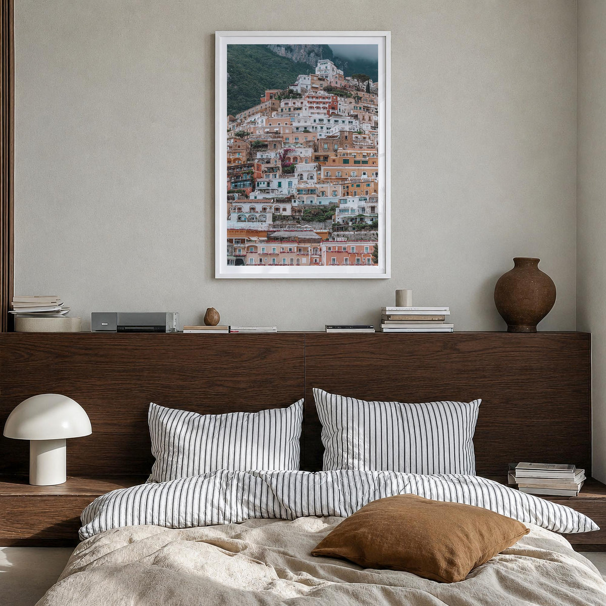 Positano no. 3 colorful photo poster of Italy – vertical wall art in white wood frame with white border, hanging on wall