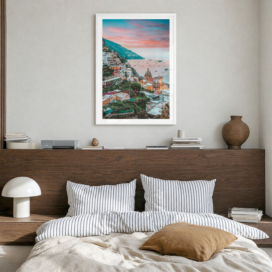 Positano Photo No 4 Poster in a white wood frame, hanging in a bedroom, white border