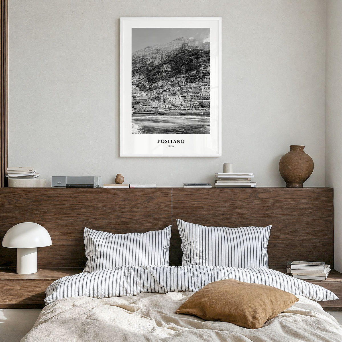 Positano Classic No 2 Poster in a white wood frame, hanging in a bedroom