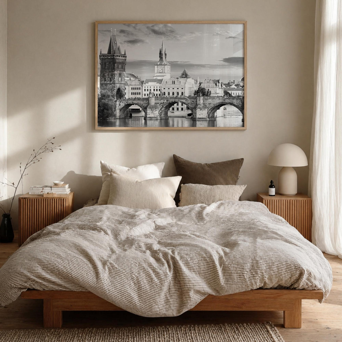 Prague black & white photo poster of Czechia – horizontal wall art in natural wood frame, hanging on wall