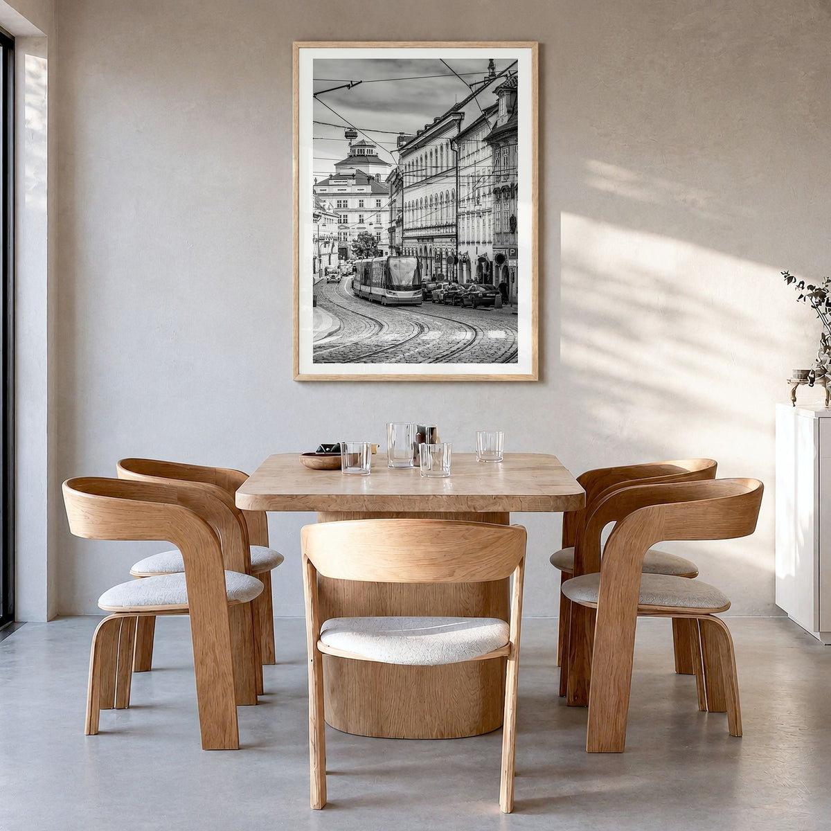 Prague Photo No 2 Poster in a natural wood frame, hanging in a dining room, white border