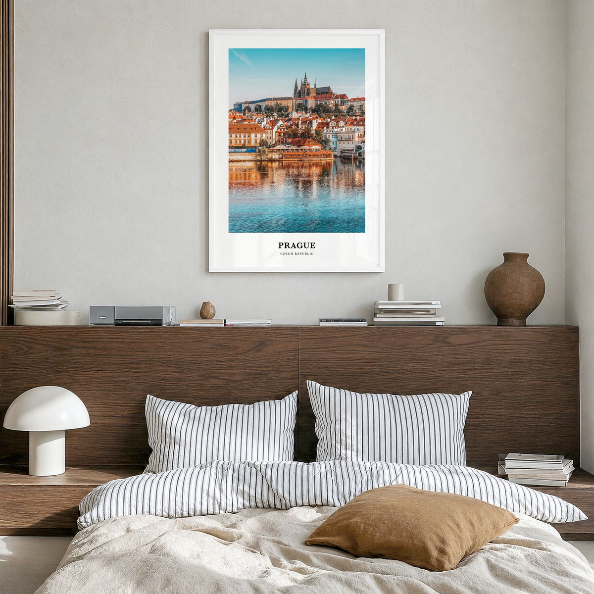 Prague Classic Poster in a white wood frame, hanging in a bedroom
